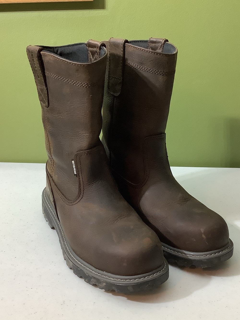 Wolverine brown steel toe 10” shaft waterproof boots, size 8EW